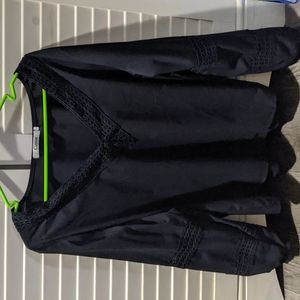 Black V-neck blouse with pattern detail